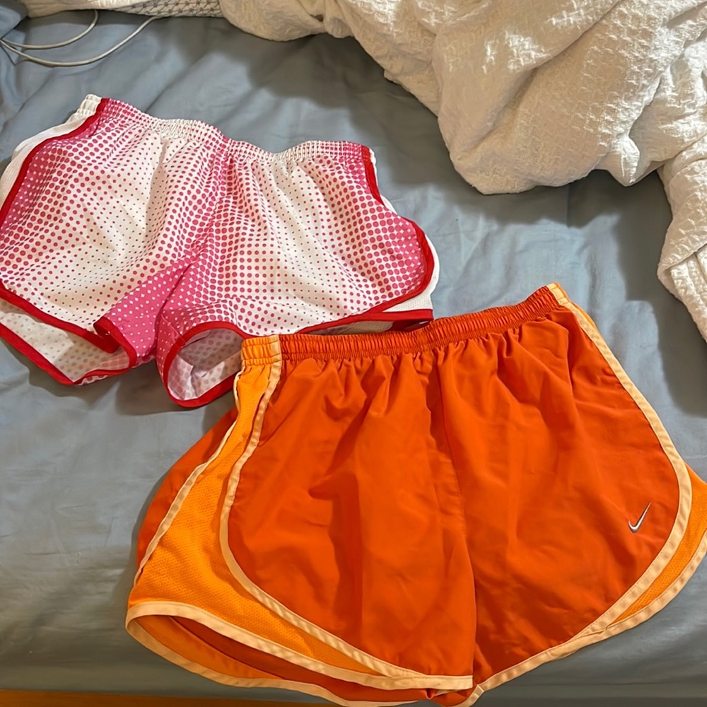 Nike running shorts. Both size adult small.
